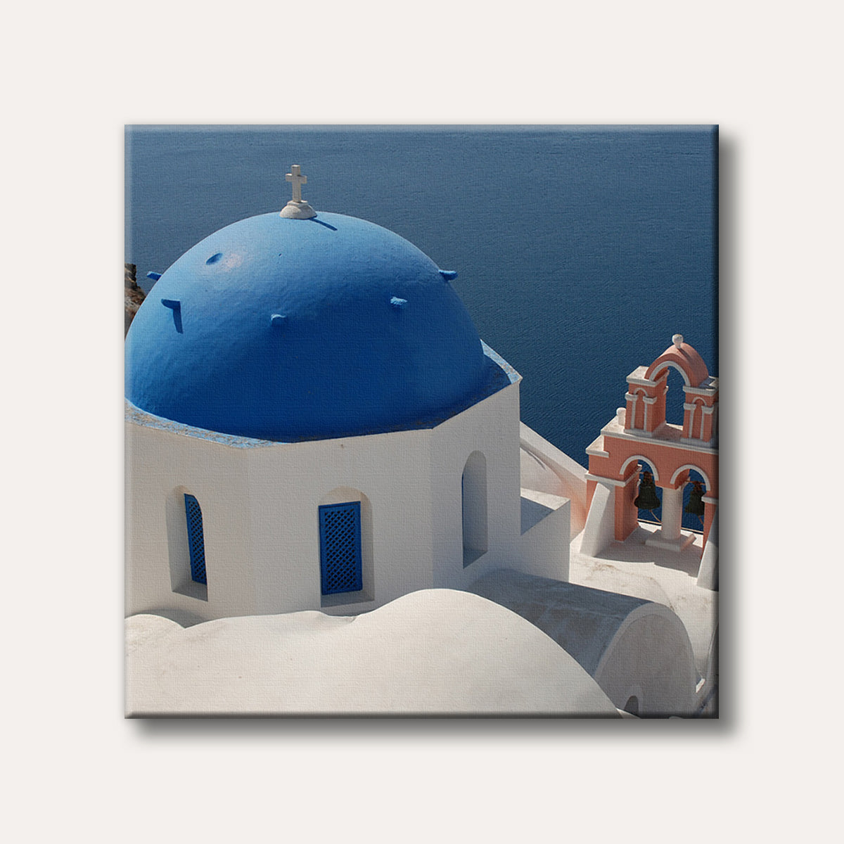 A vibrant blue-domed church with a pink bell tower overlooking the deep blue Aegean Sea, typical of Greek island architecture in a realistic style.