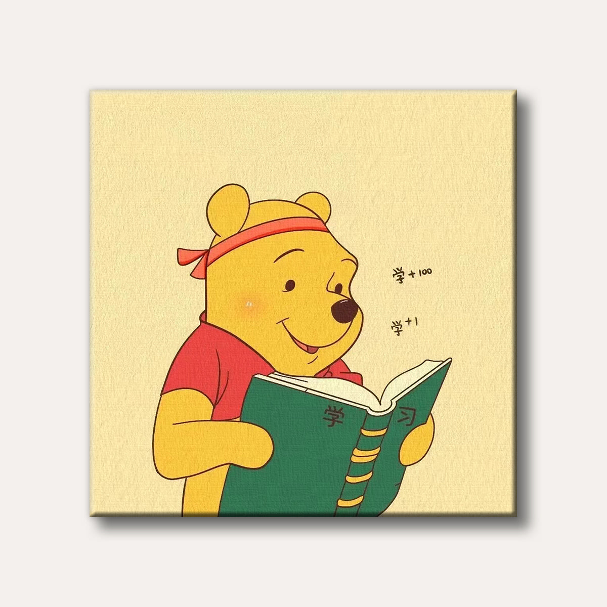 A happy cartoon Winnie the Pooh wearing a red headband and shirt, intently reading a green book, with Chinese characters floating next to him, set against a simple yellow background.