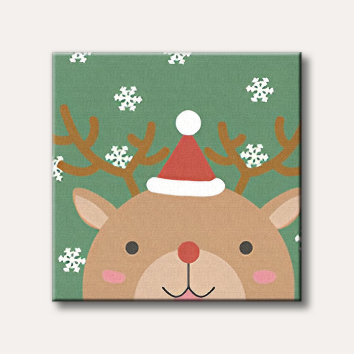 A charming cartoon reindeer wearing a red Santa hat, set against a green background with falling white snowflakes, depicted in a cute, simple style.