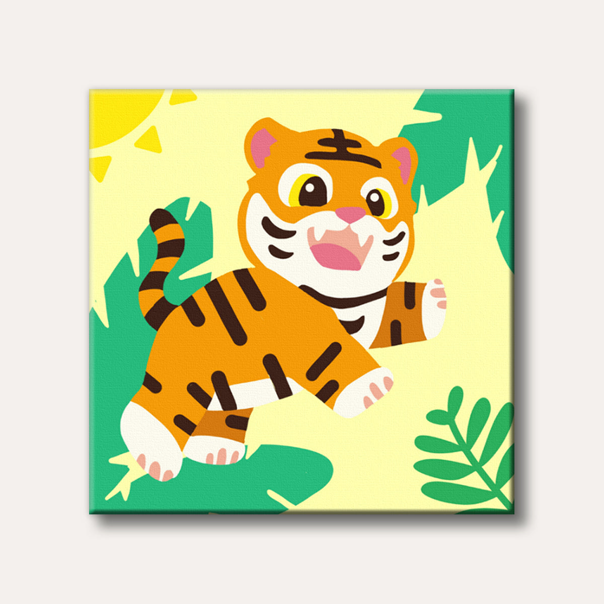 A cheerful, stylized baby tiger in orange and black with white paws, smiling and playfully reaching out, set against a bright yellow background with green leaves and a sun, depicted in a friendly cartoon style.
