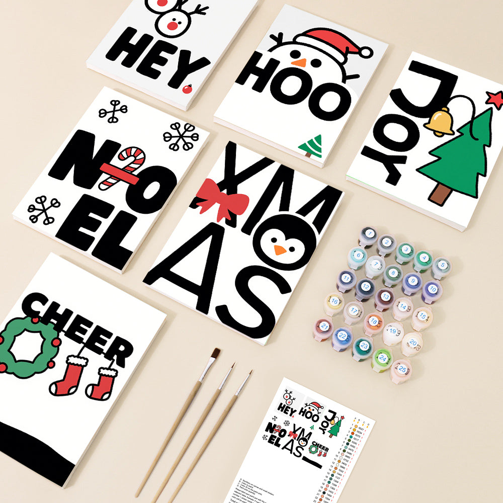 Six individual canvases displaying bold Christmas words and cute holiday illustrations like a reindeer, snowman, and tree, arranged with paint pots and brushes, in a cheerful and graphic style.