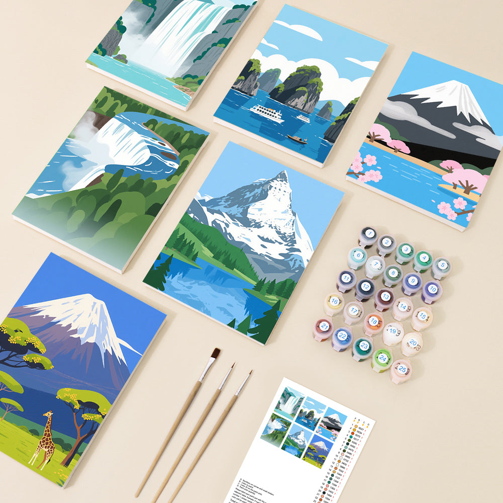 A display of several colourful paint by number canvases featuring diverse global landscapes like waterfalls, snowy mountains, and ocean scenes, alongside paint pots and brushes.