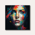 A close-up portrait of a woman's face featuring vibrant, expressive abstract paint strokes in multiple colours, emphasizing her striking blue eyes against a dark background.