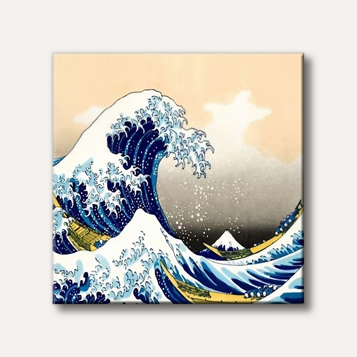A famous Japanese ukiyo-e woodblock print depicting a massive rogue wave threatening three boats, with Mount Fuji in the background, in a striking blue, white, and beige colour palette.