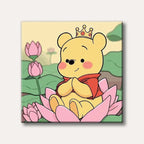 A cute cartoon bear, resembling Winnie the Pooh, wearing a golden crown and red cloak, seated in a pink lotus flower with more lotus blossoms in the background, in a cheerful and simple art style.