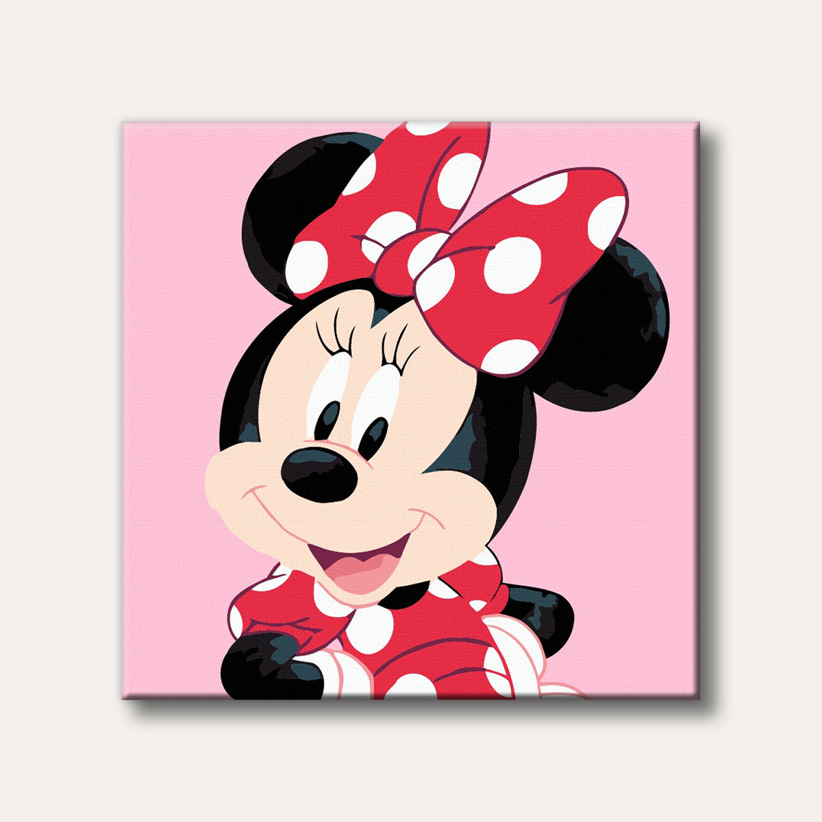 A cheerful portrait of Minnie Mouse wearing her iconic red and white polka dot bow and dress, depicted in a classic cartoon style against a light pink background.