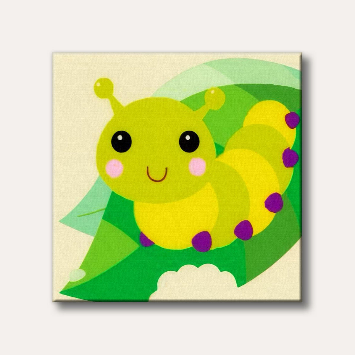 A cheerful green and yellow cartoon caterpillar with pink cheeks smiles on a green leaf with a bite taken out of it, depicted in a simple, friendly style.