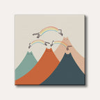 A whimsical illustration showing large, stylized cat-shaped mountains in muted teal, orange, and blue, with smaller line-drawn cats leaping over them, leaving rainbow trails on a light background.