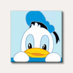 A cute, stylized portrait of Donald Duck peeking from the bottom of the frame, featuring his white head, blue sailor hat, and yellow bill, against a light blue background.