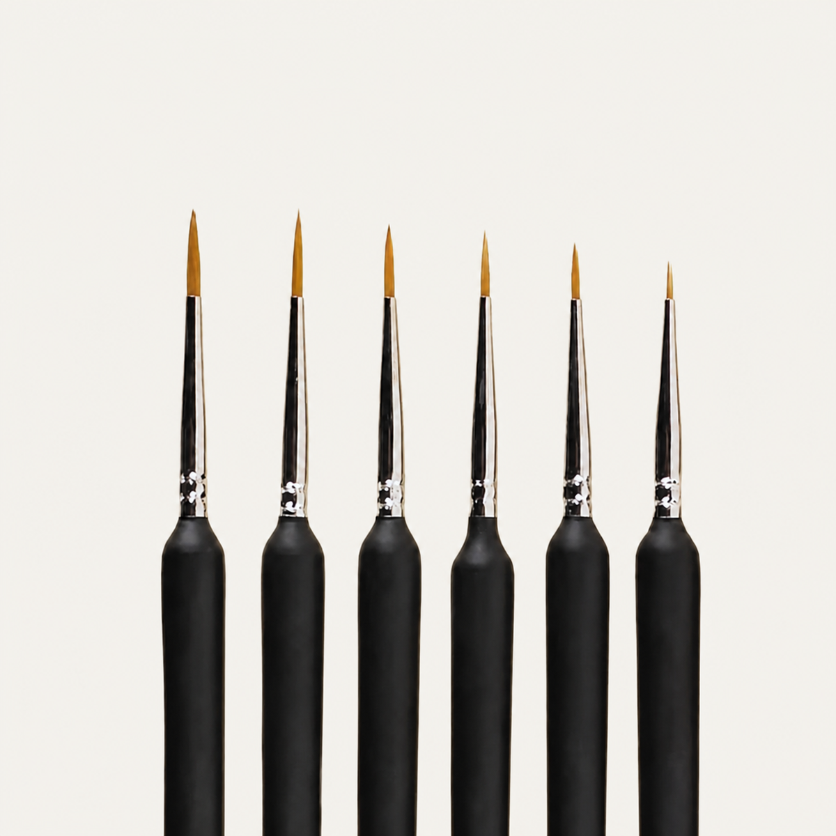 6-Pack Detail Liner Brushes on warm off-white background