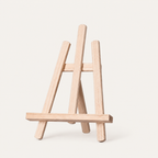 Mini Tabletop Wooden Display Easel on warm off-white background